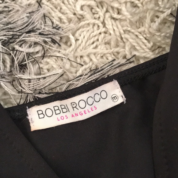 Black Halter Jumpsuit with Sheer Details - Picture 9 of 9